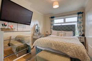 Bedroom One- click for photo gallery